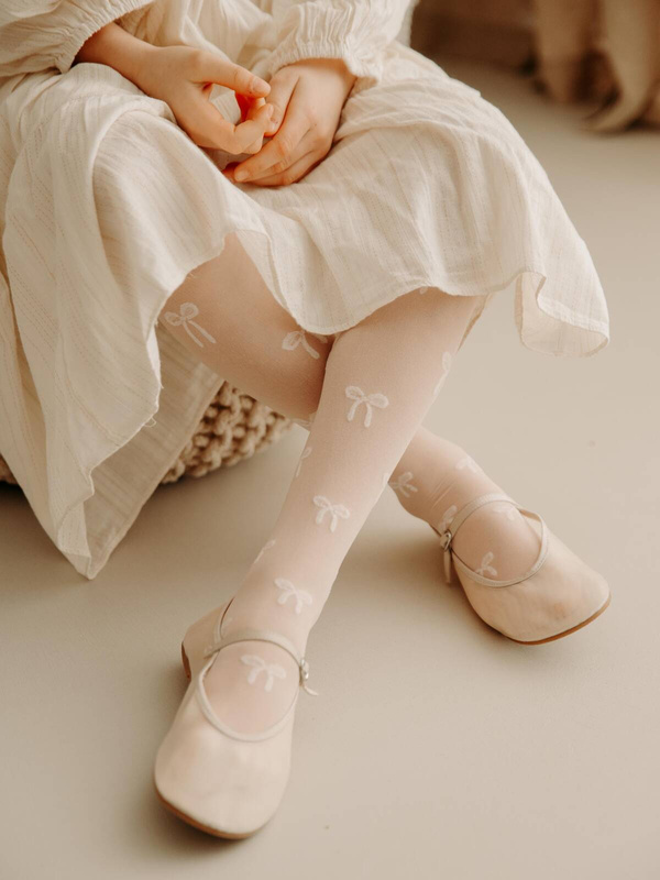 Różowe rajstopy dziecięce w kokardki Fiore EVA 116-158